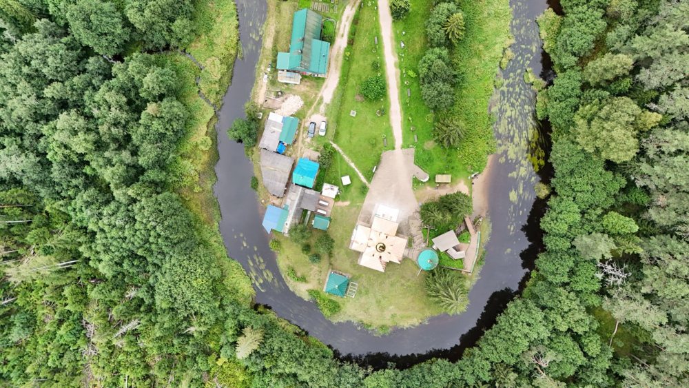Aerial view of temple grounds and surrounding river